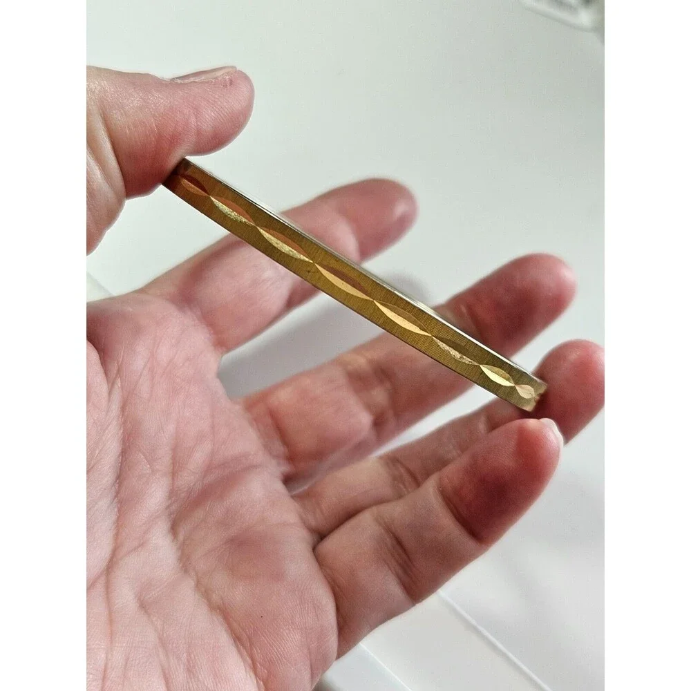 Monet gold tone diamond cut bangle bracelet 7.75